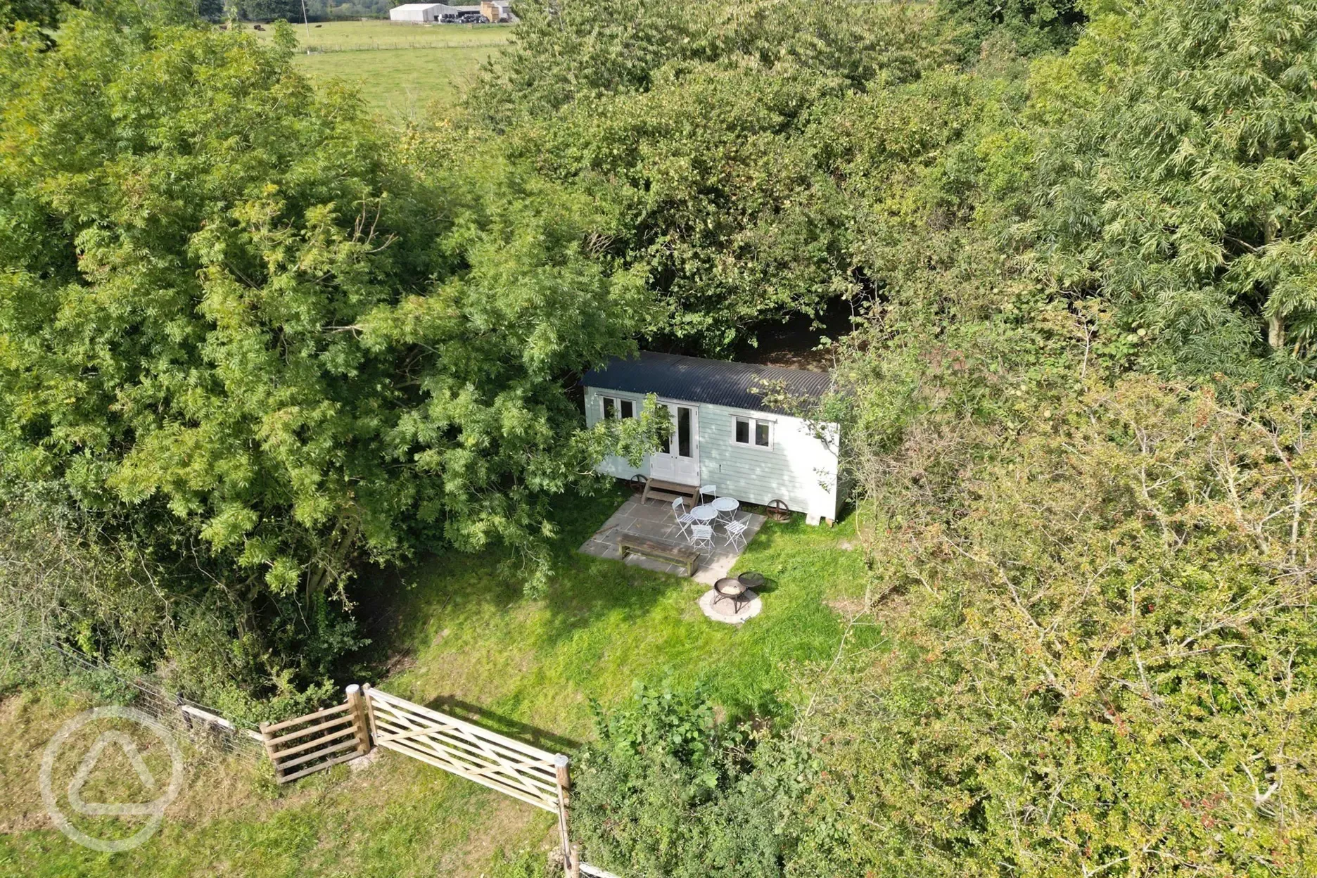 Aerial of the shepherd's hut and countryside setting