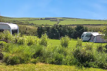 Grass pitches at Tyn Cae Campsite