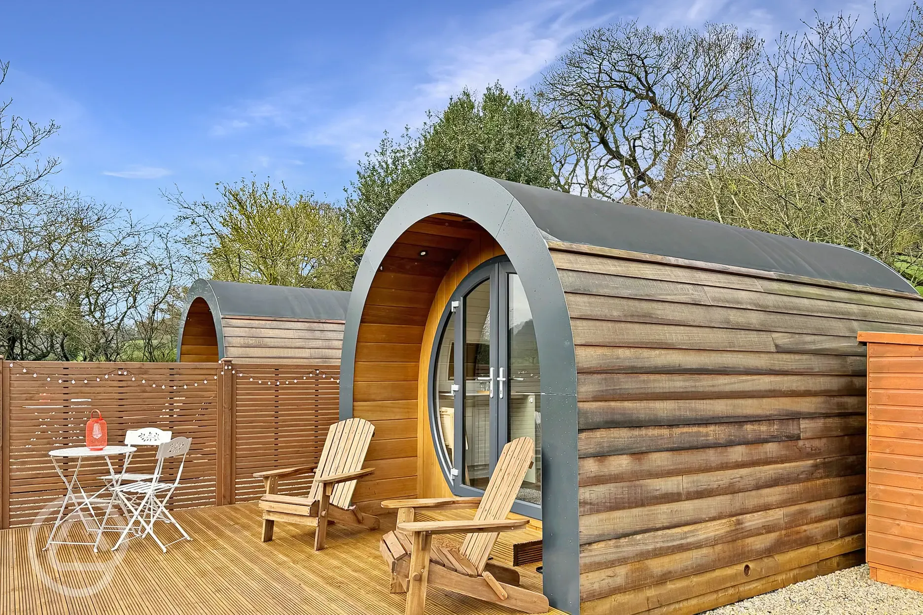 Glamping pod with a private decking and seating area