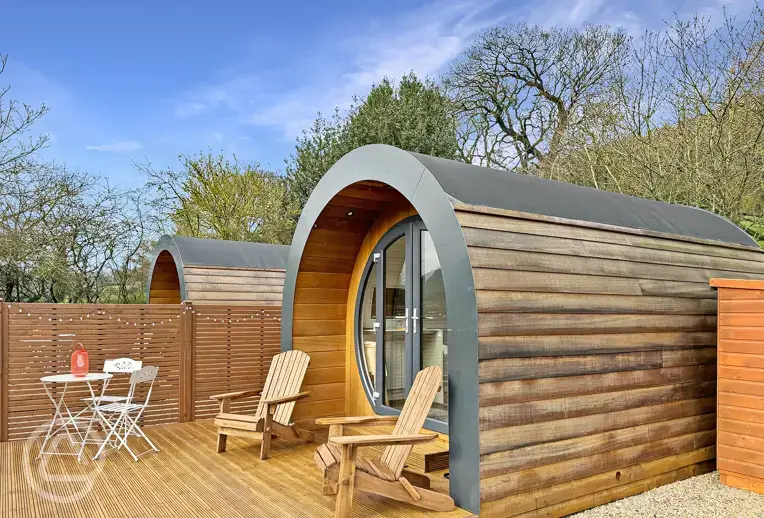 Glamping pod with a private decking and seating area