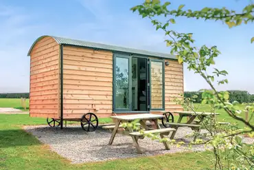 Shepherd's hut exterior at Treverven Farm Camping (four persons)