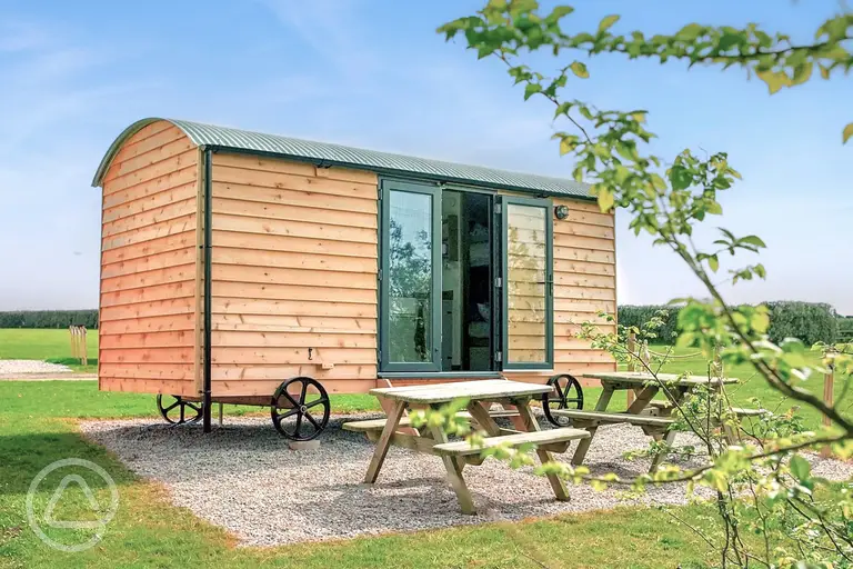 Shepherd's hut exterior at Treverven Farm Camping (four persons)