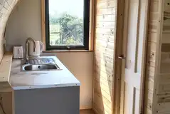 Glamping pod kitchenette with kettle, toaster and sink Glamping pod kitchenette with kettle, toaster and sink