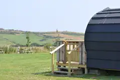 Glamping pod private veranda overlooking hillside views Glamping pod private veranda overlooking hillside views