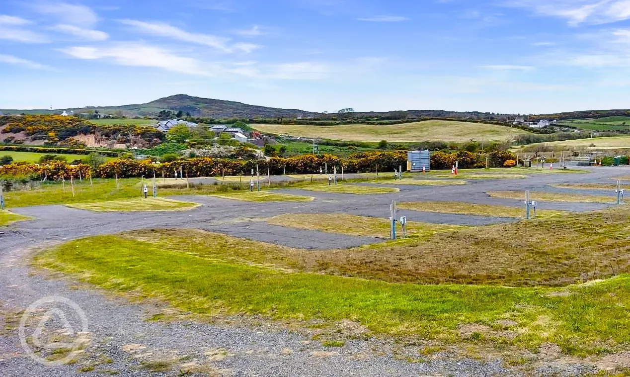 Electric hardstanding touring pitches with optional electric