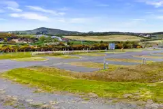 Electric hardstanding touring pitches with optional electric