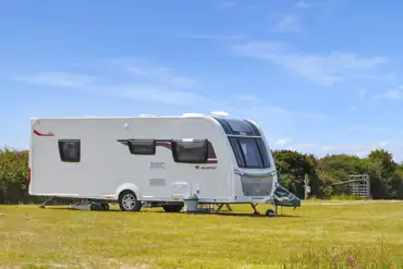 Caravan on optional electric grass touring pitches