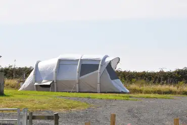 Tent on a grass pitch with optional electric