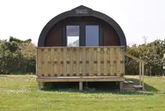 Ensuite glamping pod exterior and private veranda (two persons) Ensuite glamping pod exterior and private veranda (two persons)