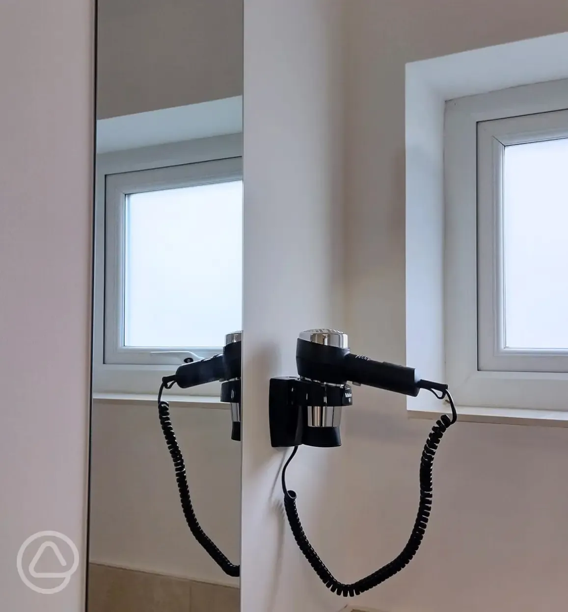 Hairdryers in toilet and shower block