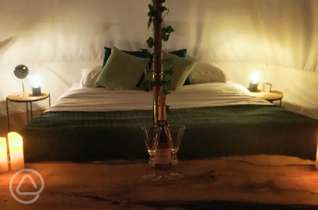 Bell tent interior at night