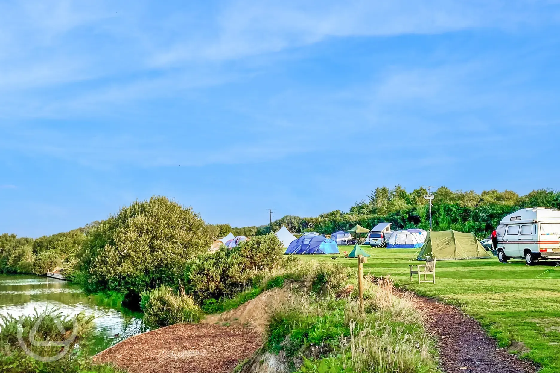 Non electric grass pitches by the lake