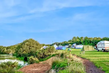 Non electric grass pitches by the lake