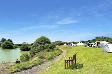 Non electric grass pitches by the lake 
