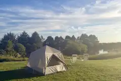 Non electric grass pitches overlooking the lake