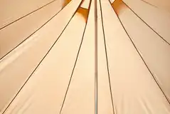 Standard furnished bell tent with a king bed 