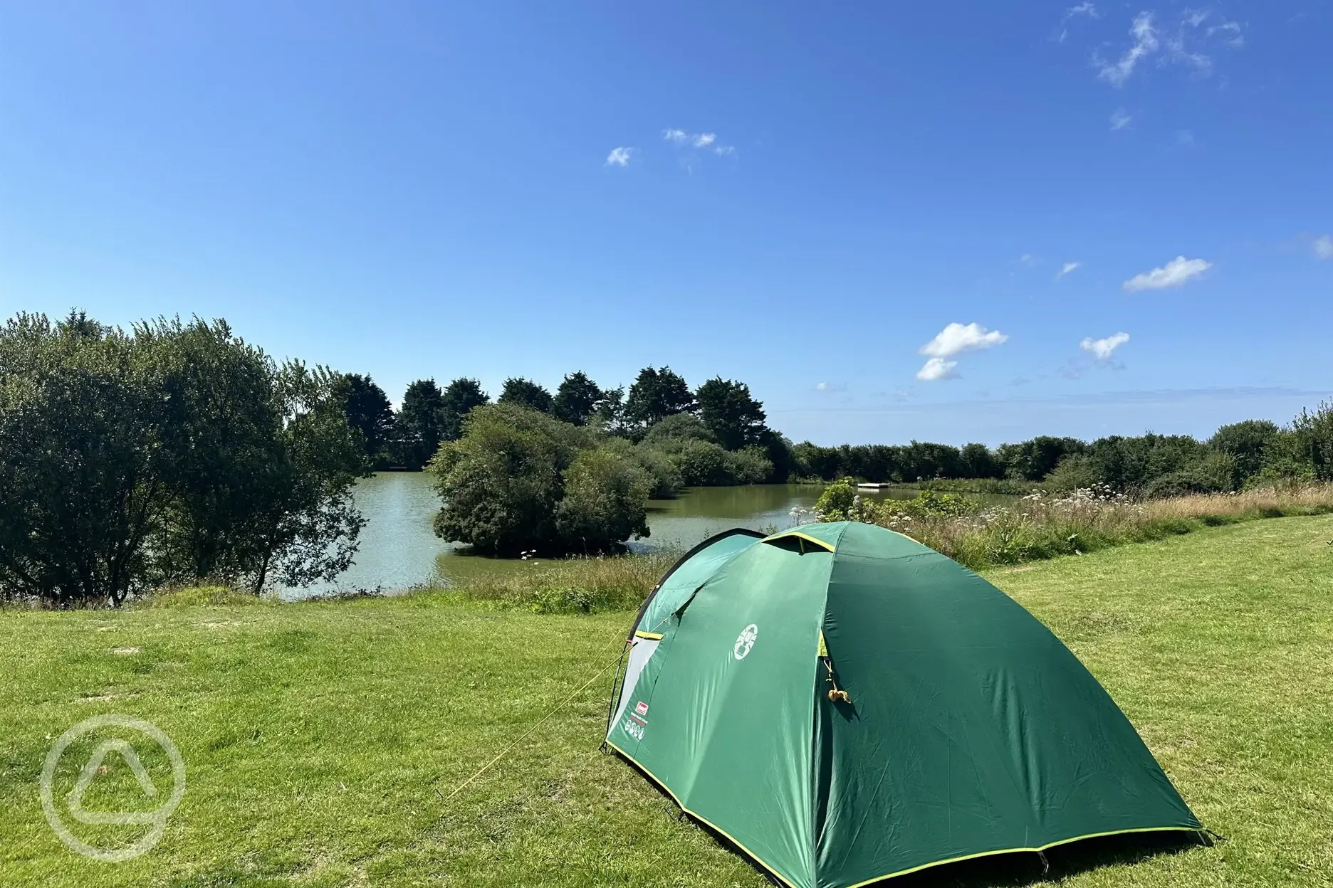 Non electric grass pitches by the lake 