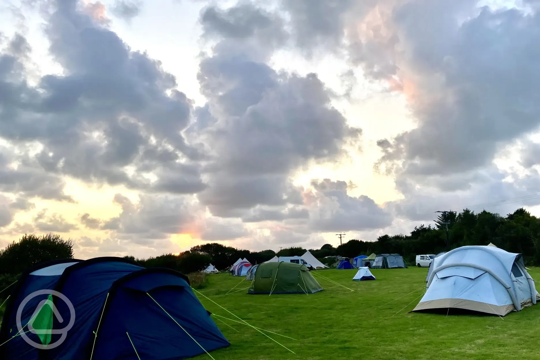 Camping field at sunset