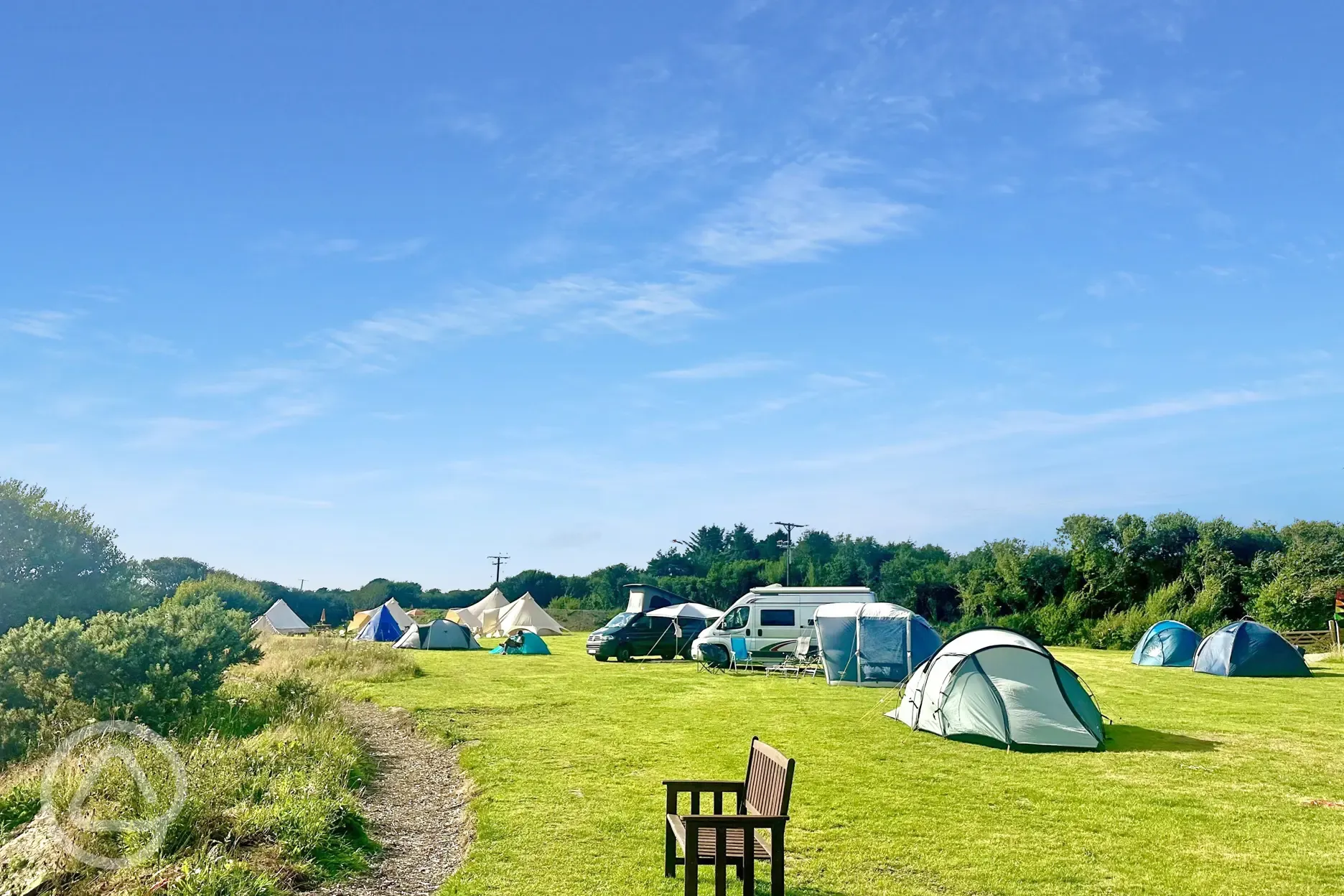 Non electric grass pitches by the lake 