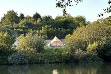 Furnished bell tent by the lake