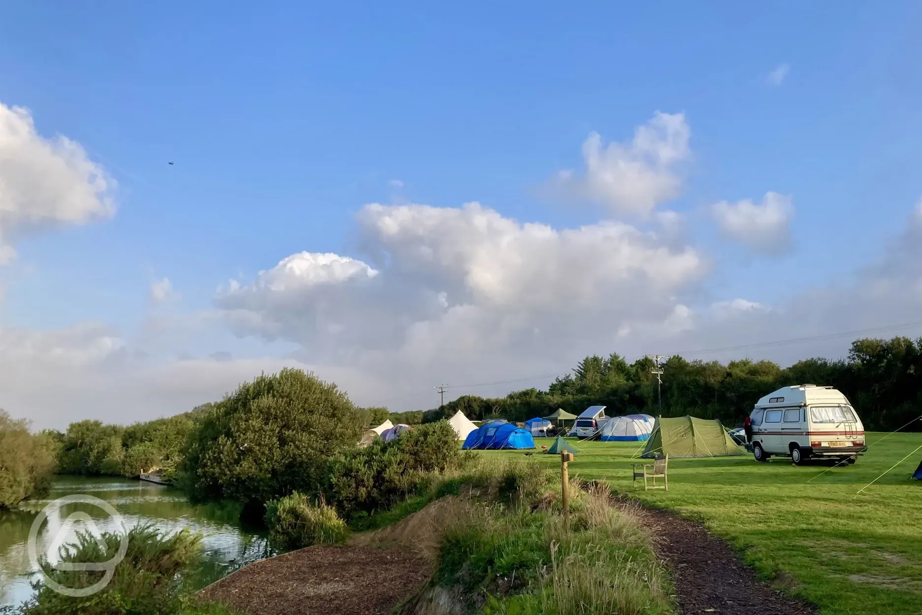 Non electric grass pitches by the lake