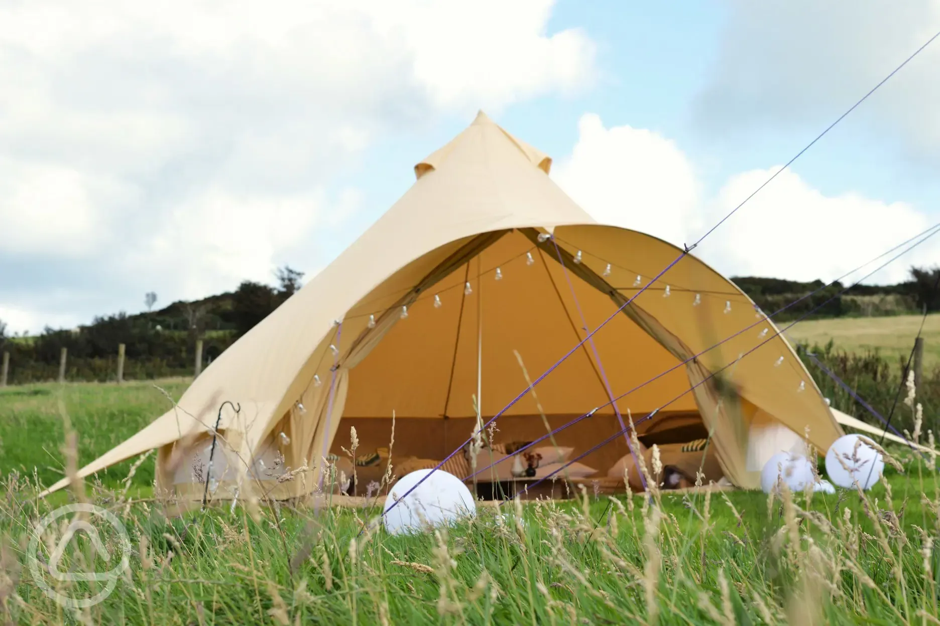 Luxury furnished lakeside bell tent