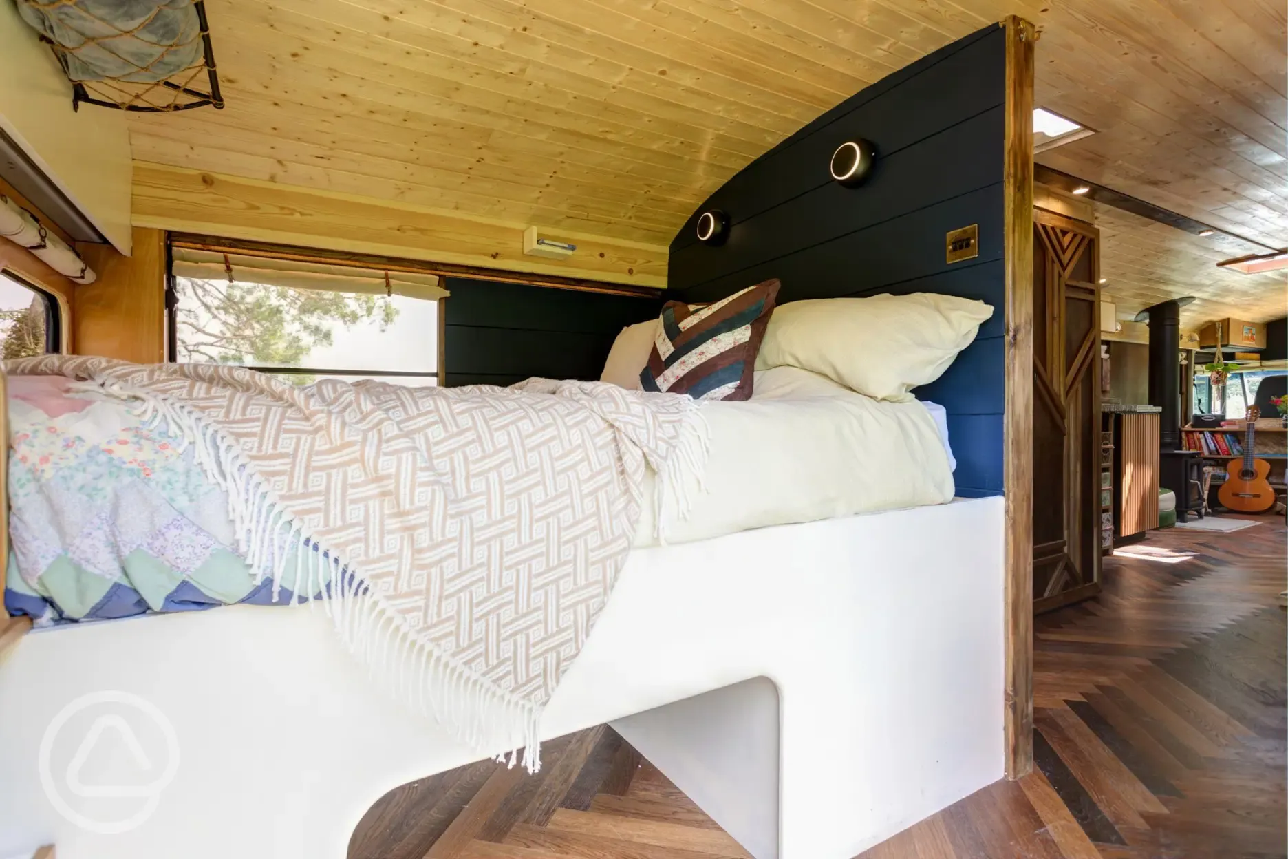 Glamping school bus king size bed