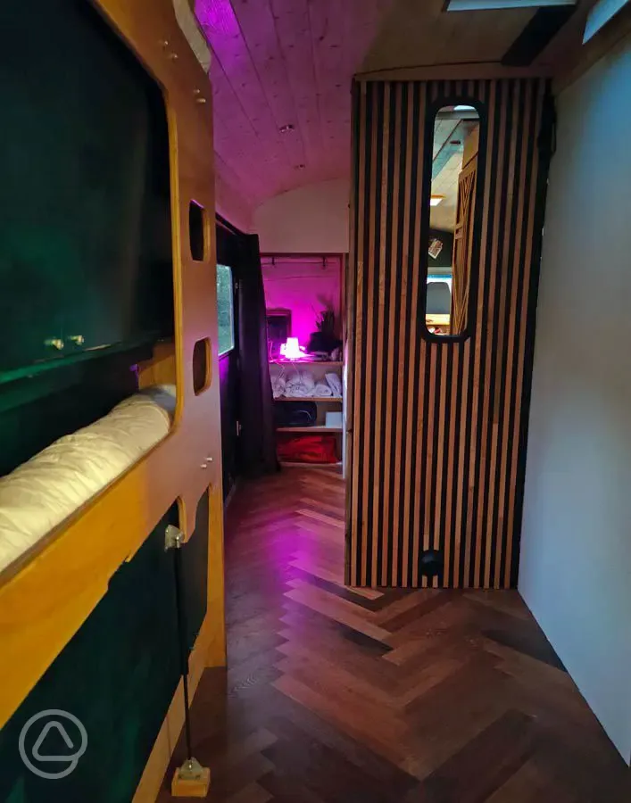 Glamping school bus fold away bunk-beds