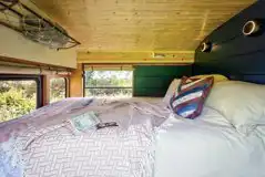 Glamping school bus king size bed