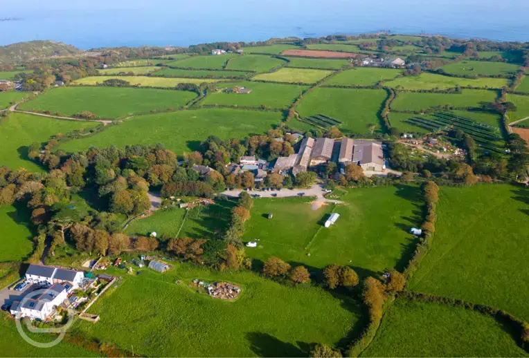 Aerial of Roskilly's Camping and the coast