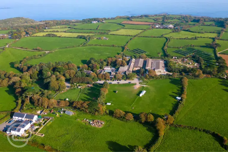 Aerial of Roskilly's Camping and the coast