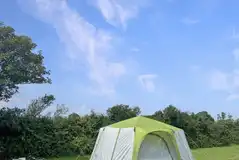 Non electric grass tent pitches