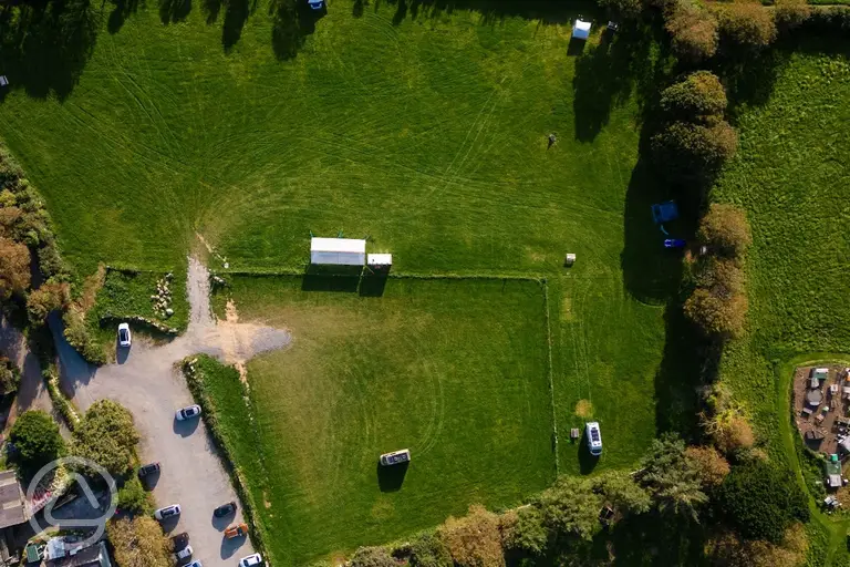 Aerial of Roskilly's Camping surrounded by trees