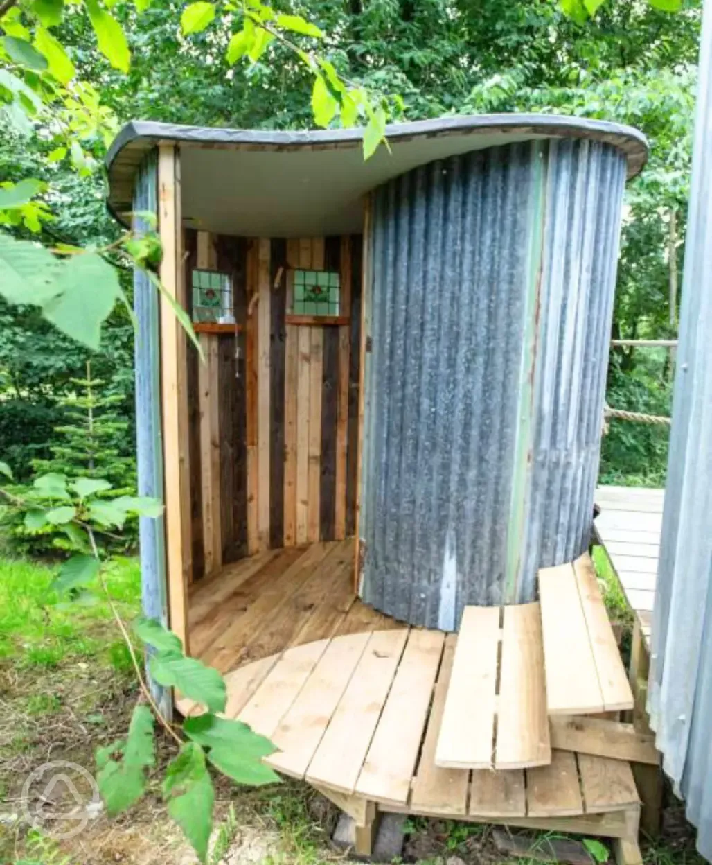 Shepherd's hut private spiral shower