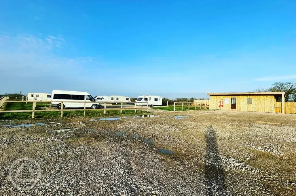 Hardstanding pitches and facility block