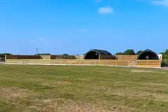 Two ensuite glamping pods with an outdoor space at Pointer Farm Campsite