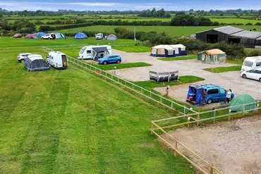 Aerial of the grass and hardstanding pitches at Pointer Farm Campsite