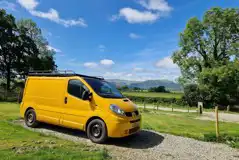 VW campervan on an electric hardstanding pitch VW campervan on an electric hardstanding pitch