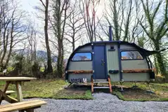 Foot O'Skiddaw large landpod with shoe hooks, a picnic bench, and small steps