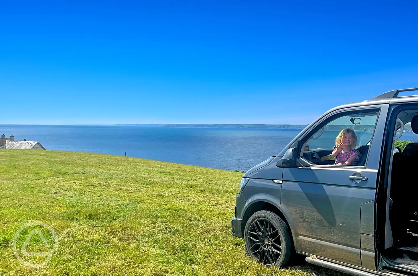 Non electric grass pitches with sea views
