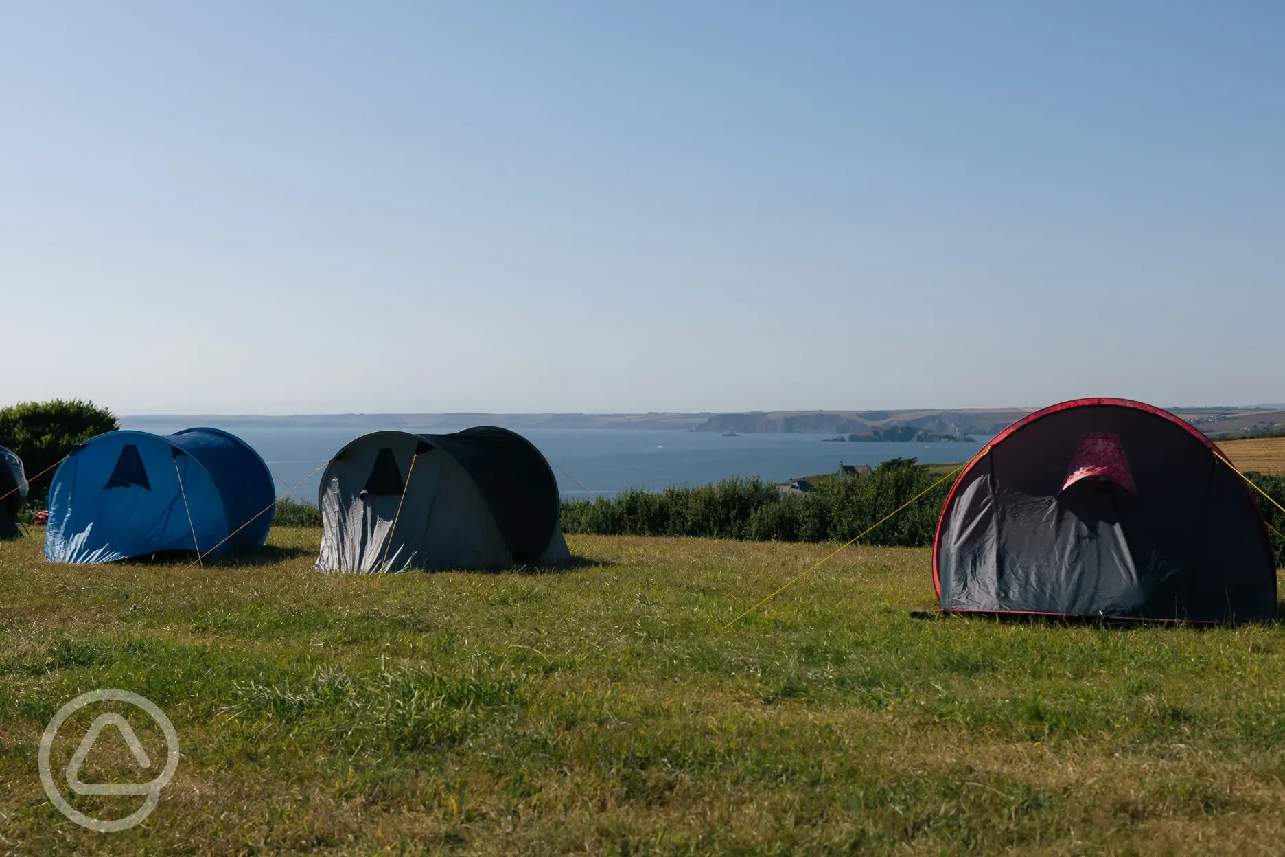 Non electric grass pitches with sea views