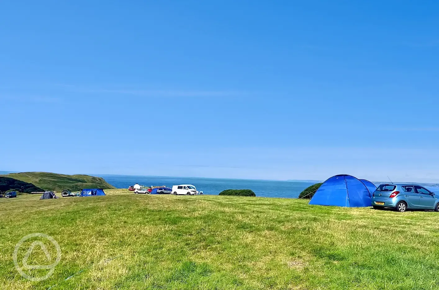 Non electric grass pitches with sea views