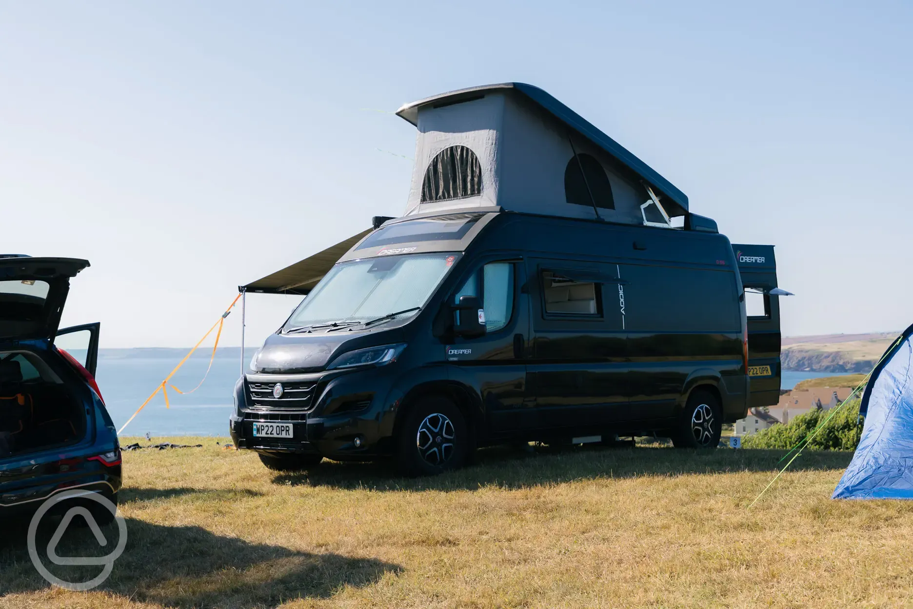 Non electric grass pitches with sea views