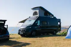 Non electric grass pitches with sea views