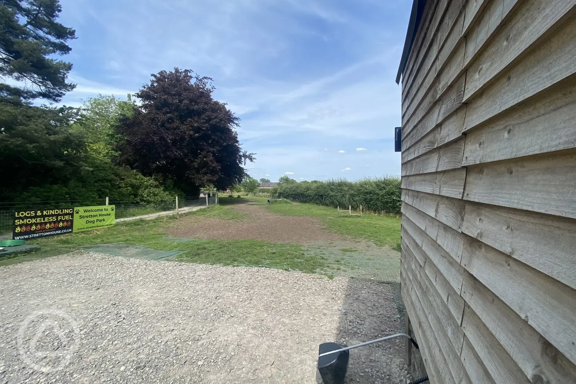 Dog park paved and grass area