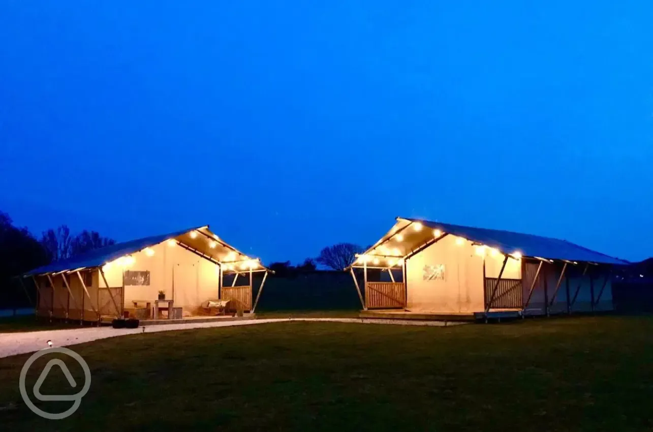 Safari tents at night