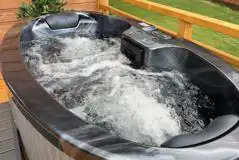 Glamping lodge with private electric hot tub