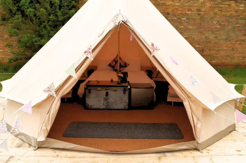 Furnished bell tent interior at Cherry Burton Leisure Park