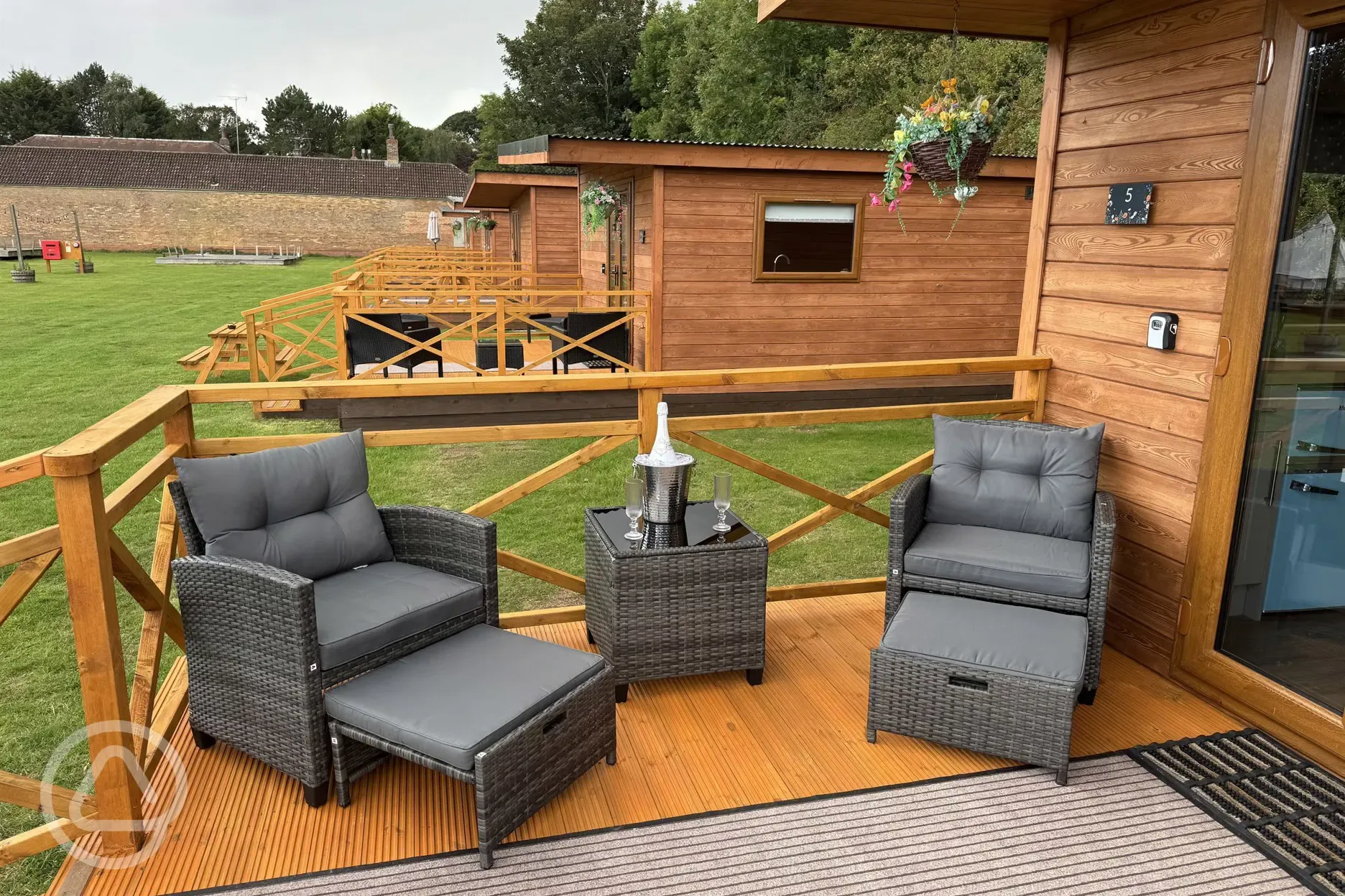 Glamping lodge decking with outdoor furniture