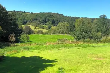 Non electric grass pitches with countryside views